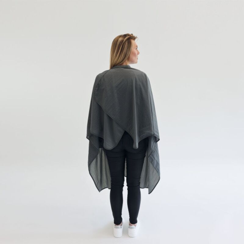 Harmaa leikkauskappa takaa.