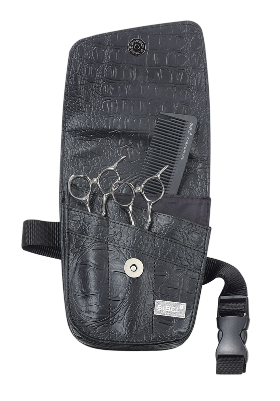 Kampaajan tarvikevy&ouml;.